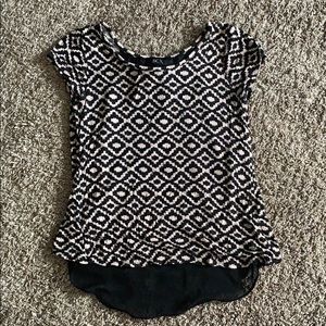 Patterned top w/ bow and sheer fabric in back